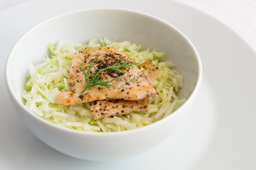 white cabbage salad with chicken  and dill dressed with oil