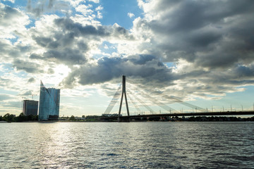 Fototapeta na wymiar Modern bridge on Daugava river in Riga, capital of Latvia.
