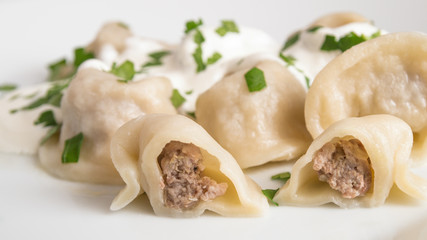 dumplings with meat filling cut open