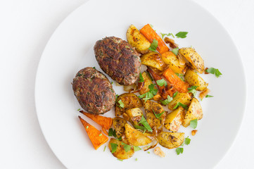 fried meatballs with roasted vegetables