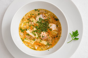 fish soup decorated with parsley