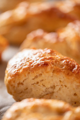 Tasty, fragrant and tender scones with apples from the oven close-up