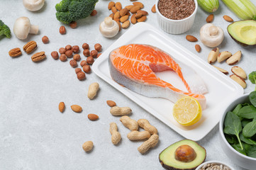 Keto diet concept. Ketogenic diet food-vegetables, fish, eggs, cheese, nuts. Balanced low-carb food background. 