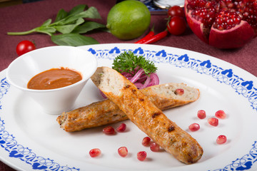 Grilled kebab meat served on a plate