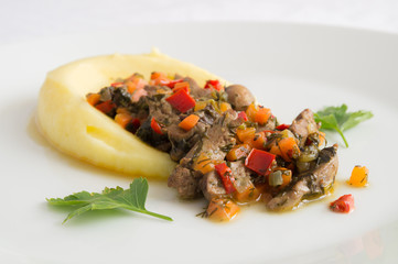 rabbit heart, liver, kidneys stew with vegetables