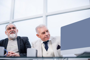 Fototapeta premium business partners sitting at the negotiating table