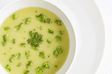 potato broccoli soup puree decorated with broccoli pieces