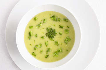 vegetable soup puree decorated with broccoli