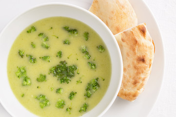 potato soup puree with broccoli served with pita
