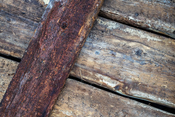Old wooden boards after the collapsed house