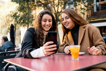 Two caucasian women having a break