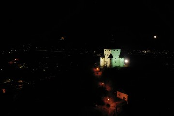 Aerial night view of Banska Stiavnica city in Slovakia