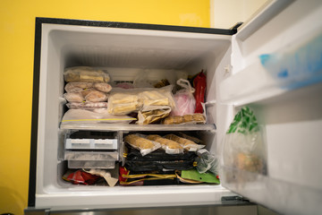 Freezer full of frozen food