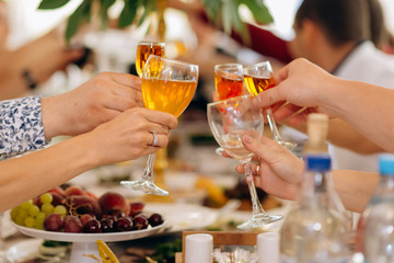couple toasting with wine glasses of champagne