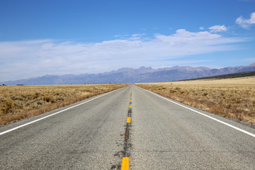 Open Highway with mountain backdrop