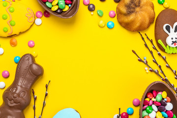 Easter Theme Background. Chocolate Rabbit, Egg and Festive Food