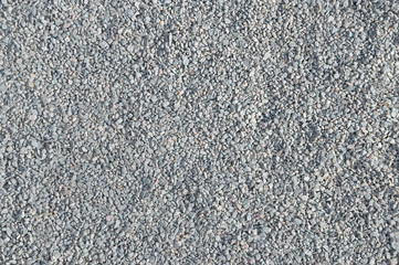 Old grey stone pavement background close up