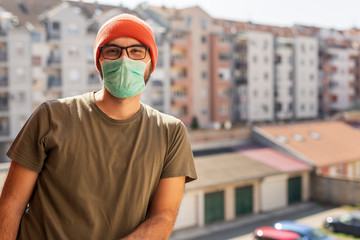 Man wearing medical face protection mask during covid-19 outbreak