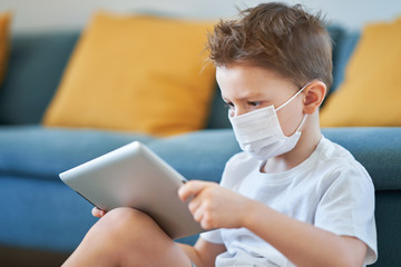 Little boy at home quarantine during coronavirus pandemic