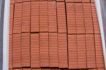 Stack of Red clay brick. Building brick