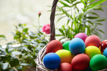 Easter Day, basket with colorful Easter Eggs