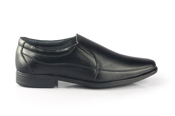 Black leather elegant shoes on gray background