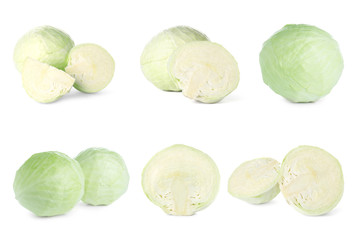 Set of fresh ripe cabbages on white background