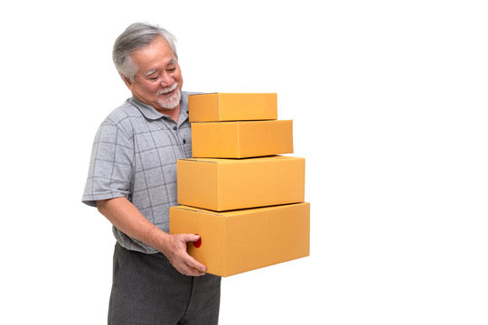 Happy asian senior man holding package parcel box isolated on white background, Delivery courier and shipping service concept
