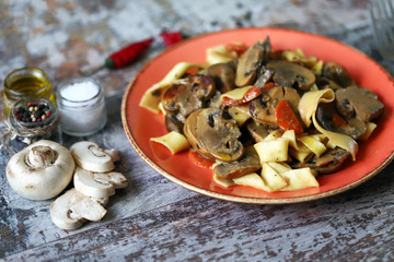 Pasta with mushrooms in a creamy sauce. Mushrooms pasta recipe.