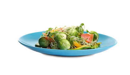 Tasty fresh salad with Brussels sprouts isolated on white