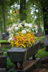 funeral flowr arrangement with lilies and white chrysanthemums