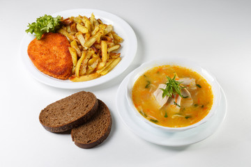 Multi-course dinner offer on white plates.