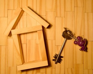 key on wooden background