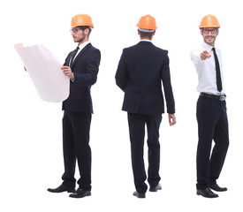 in full growth .successful architect engineer in orange helmet.