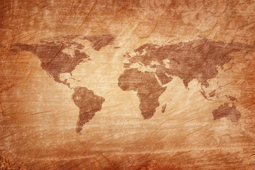 Fototapeta na wymiar Old map of the world on a old wooden parchment background. Vintage style. Elements of this Image Furnished by NASA.