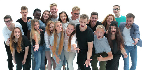 group of cheerful young people looking at the camera.