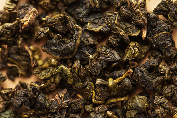 Dry milk green oolong tea close-up full frame.