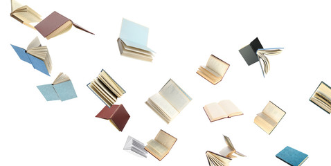Old hardcover books flying on white background