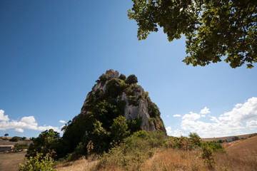 Morgia di Pietravalle or Morgia dei Briganti, a huge limestone formation rock. The Morge park of...