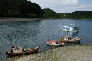 Fototapeta na wymiar Boats in the Angelmo district of Puerto Montt.