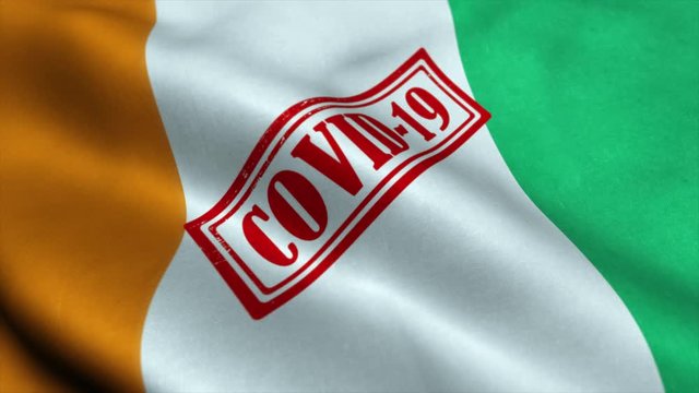 Covid-19 stamp on the flag of Ivory Coast. Coronavirus concept