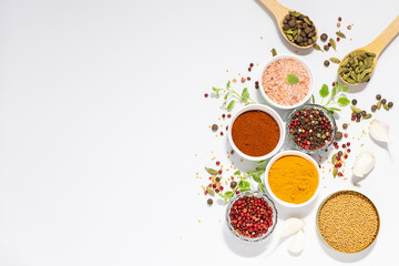 Set of aromatic organic spices and herbs on white background with copy space for your design.
