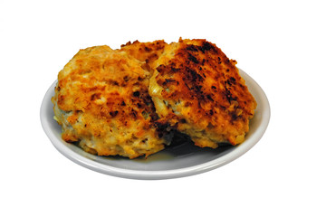 Homemade chicken cotlets on a plate isolate on a white plate on a white plate close-up.