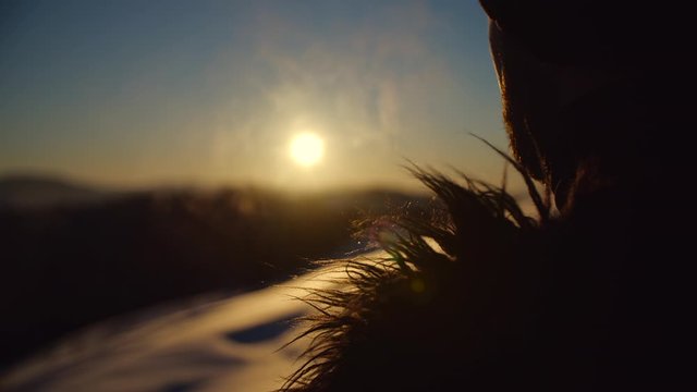 Men lets out steam in the cold, Carpathian mountains, Ukraine