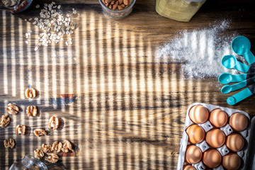 Sunlight on table with baking ingredients