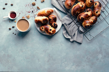 Homemade baked goods on plate with cup of coffee for breakfast in the morning with copy space....