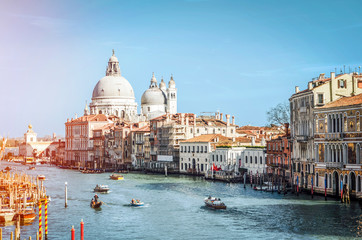 Fototapeta premium Canal with boats in Venice, Italy