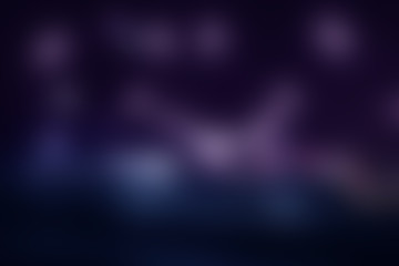 Blurred view of abstract dark defocused background