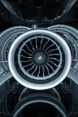 Turbine Engine. Aviation Technologies. Aircraft jet engine detail during maintenance. Blue toned.