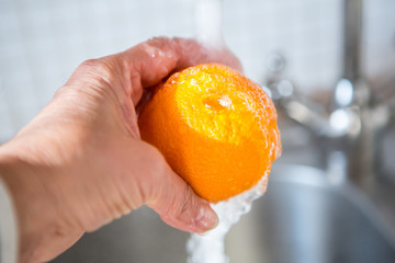 Coronavirus - Epidemic Outbreak. Cleaning food from supermarket. 